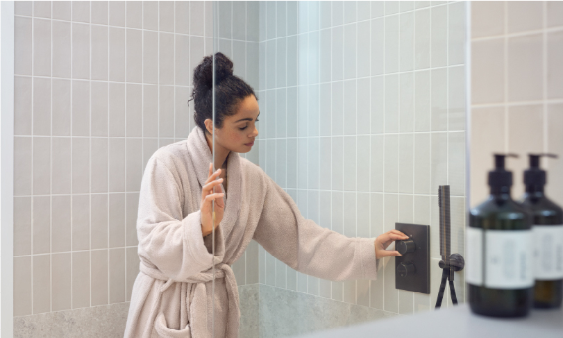 Related Woman in bathrobe in bathroom